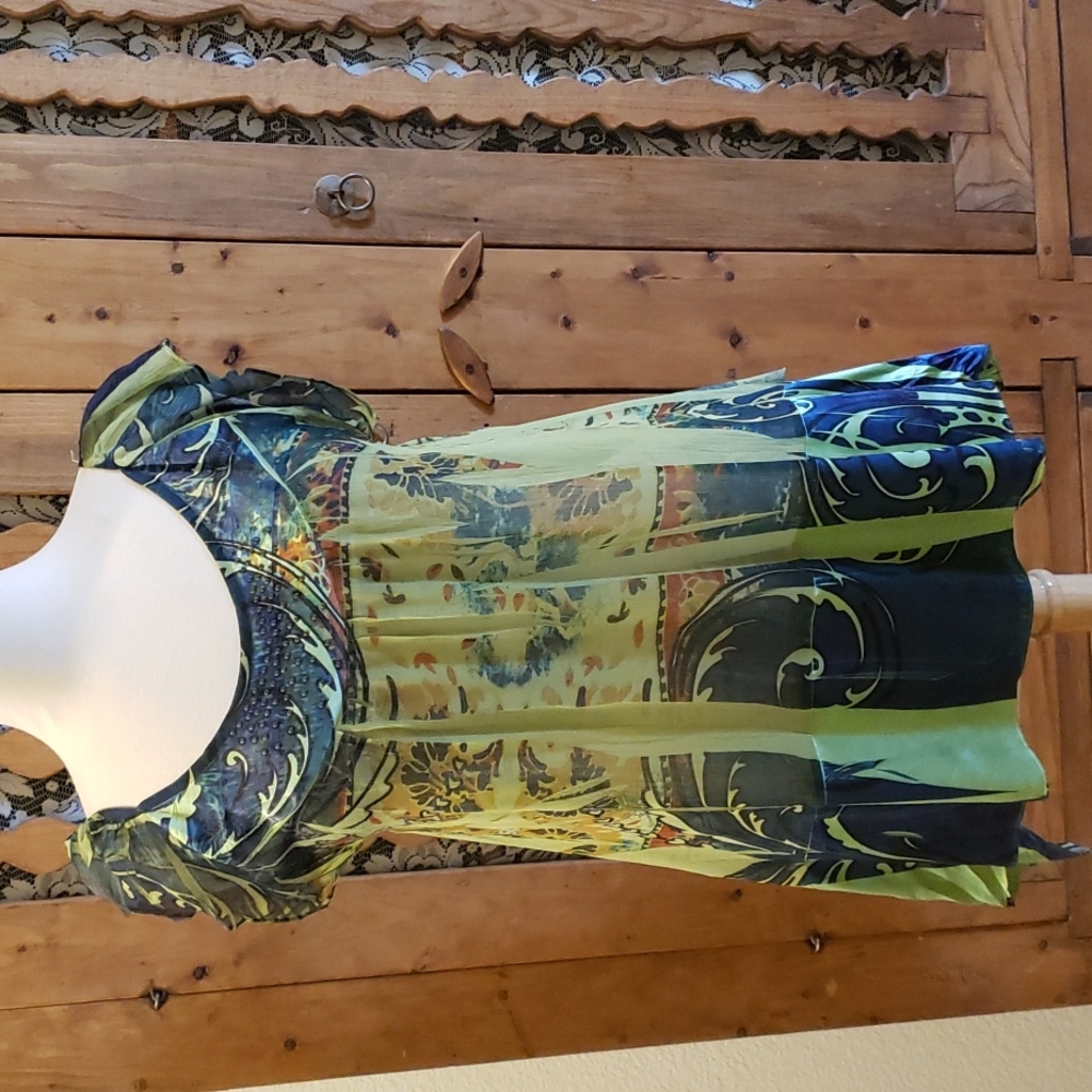 Green/blue sheer print tuni. Sleeveless with handkerchief hemline.